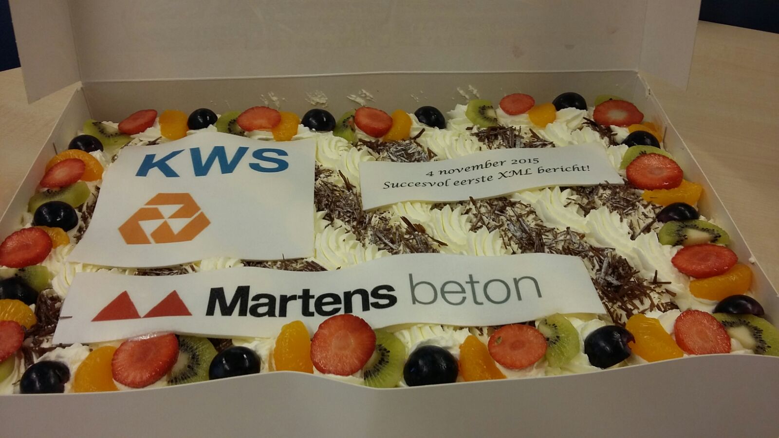 Taart bij eerste XML-bericht Martens Beton